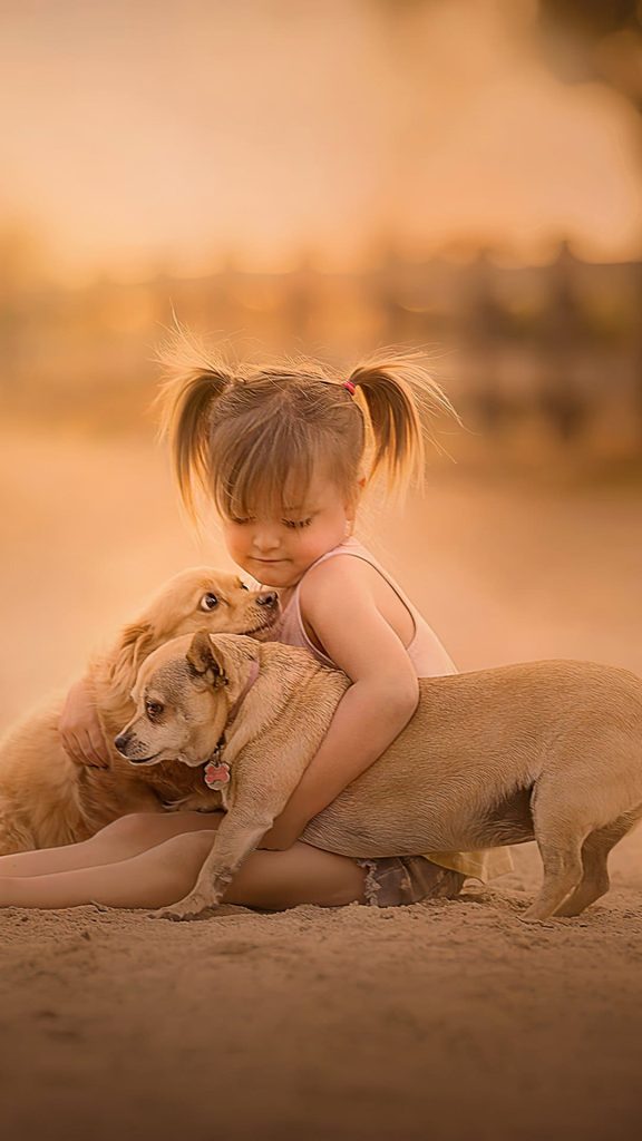 Little Girl With Cute Pups